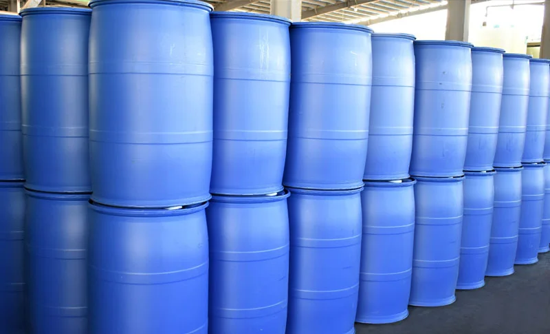 Blue export drums of sodium chlorite lined up in the finished goods store