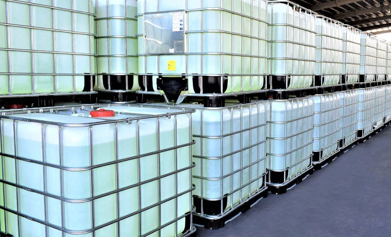 IBC totes of liquid sodium chlorite lined up in the finished goods warehouse